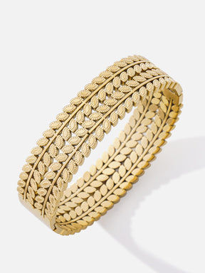 Brazalete de acero inoxidable con dos anchas hileras de formas de hoja